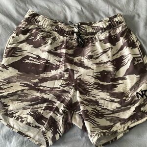 Men’s medium NFQ shorts white and gray